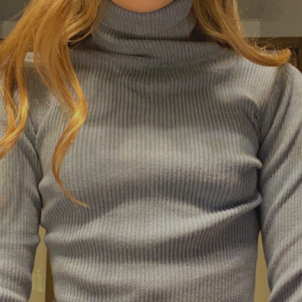 light blue turtle neck